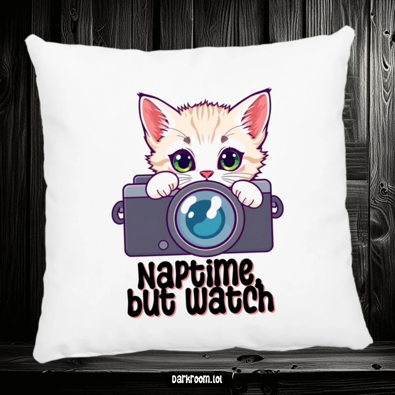 Funny kitten camera lens pillow, peeking with wide, curious eyes, offering comfort and a touch of playful feline photography charm.