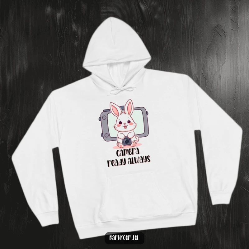 Funny fluffy bunny photographer hoodie, posing playfully in front of a stylized camera screen, offering comfort and artistic charm.