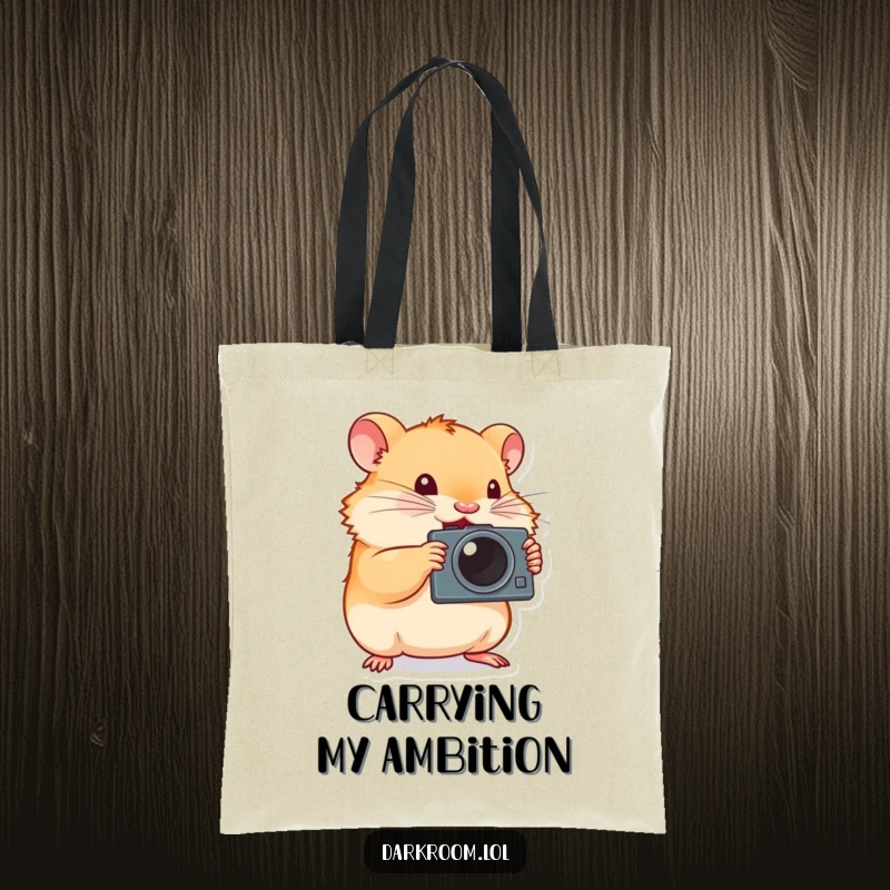 Funny hamster photographer tote bag, tiny and determined, enthusiastically pressing a camera shutter, perfect for carrying photography essentials.